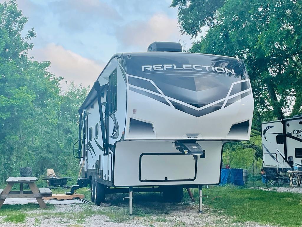 Grand Design Reflection fifth-wheel front view parked at Sugar Land RV Park